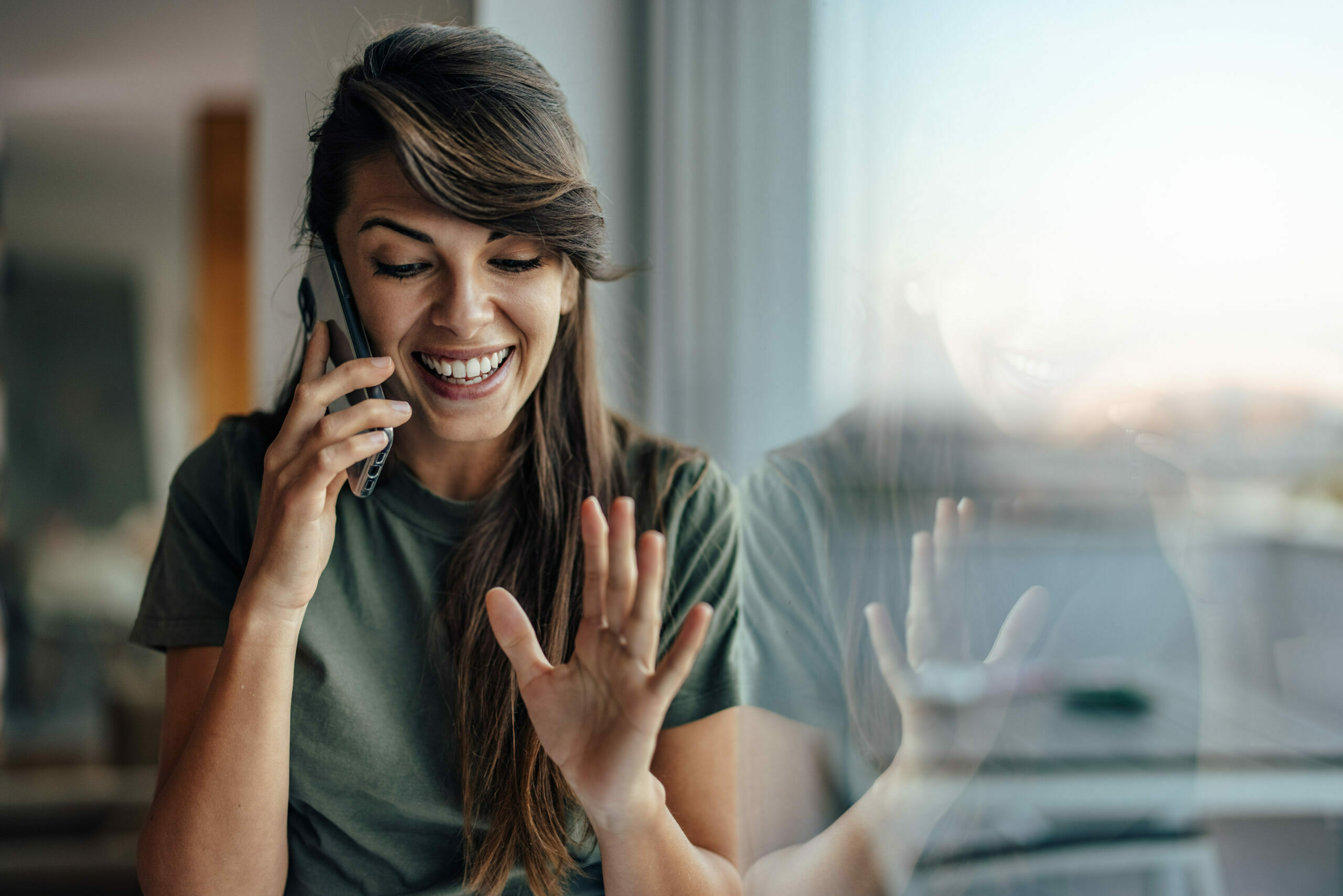 Excited caucasian woman, receiving good news on the phone